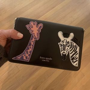 New Kate Spade black crossbody clutch with a zebra and giraffe